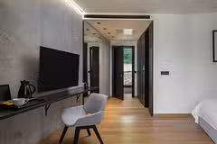 Palazzo Villa TV and armchair