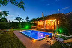 Trapezaki Secret Garden villa and pool night shot