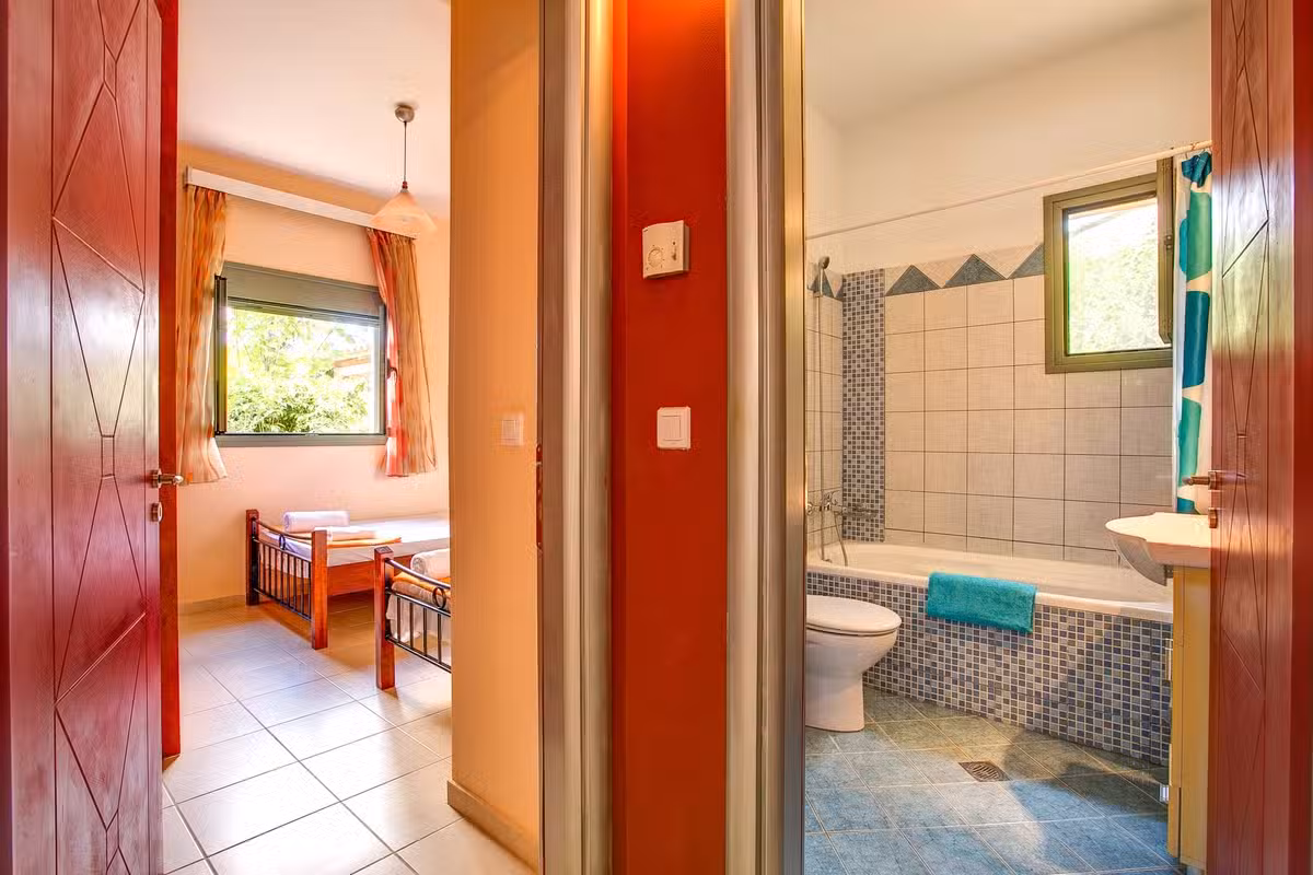 Trapezaki Secret Garden twin room and bathroom