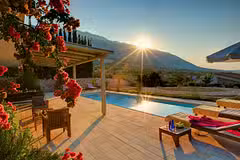 Villa Asterias pool sunset