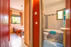 Trapezaki Secret Garden twin room and bathroom