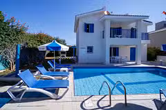 Villa Thalia villa, pool and sunloungers