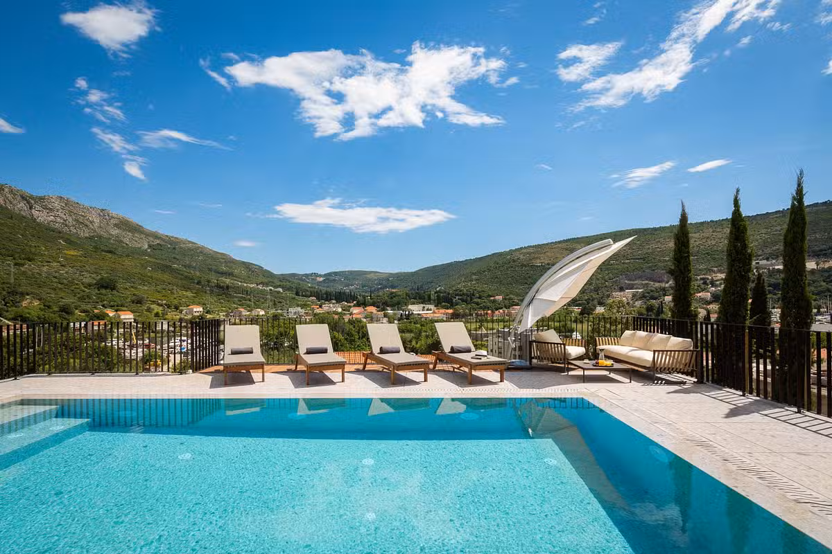 Palazzo Villa pool and sunloungers